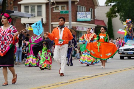 Photo for Milwaukee, Wisconsin USA - September 16th, 2023: Latino American, Hispanic American and Mexican American families held their annual Mexico Independence Day parade. - Royalty Free Image