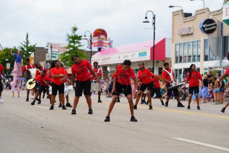 Photo for Wisconsin Dells, Wisconsin USA - September 18th, 2023: Soul Steppers drill team performed in the streets during Wo Zha Wa festival parade - Royalty Free Image