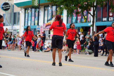 Photo for Wisconsin Dells, Wisconsin USA - September 18th, 2023: Soul Steppers drill team performed in the streets during Wo Zha Wa festival parade - Royalty Free Image