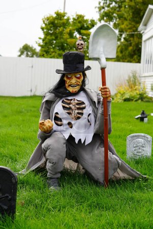 Photo for Fond du Lac, Wisconsin USA - October 14th, 2022: Homeowners of the community dressed up their house and yard with scary Halloween decorations for 2022. - Royalty Free Image