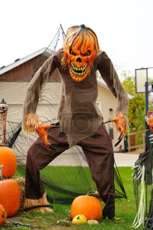Photo for Fond du Lac, Wisconsin USA - October 14th, 2022: Homeowners of the community dressed up their house and yard with scary Halloween decorations for 2022. - Royalty Free Image