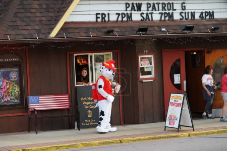 Photo for Fond du Lac, Wisconsin USA -August 22nd, 2019: Man in costume dog near paw patrol station. - Royalty Free Image