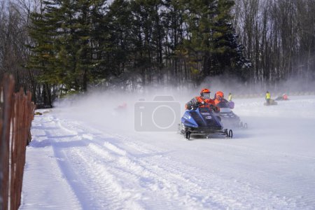 Photo for Hortonville, Wisconsin / USA - January 26th, 2019: Many riders on Quad-bikes and ATVs were having fun riding around on a snow-covered frozen iced lake. - Royalty Free Image
