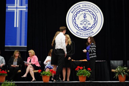 Photo for Wisconsin USA - graduation celebration in Marian University of Wisconsin is a private Catholic University offering an education meant to inspire and turn passion into action - Royalty Free Image