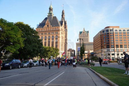 Photo for Milwaukee, Wisconsin / USA - August 20th, 2020: Coalition to march on the DNC protesters of black lives matter and climate change activists protested through the streets to the wisconsin center. - Royalty Free Image