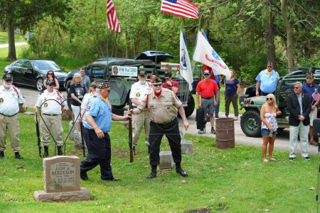 Photo for Oconomowoc, Wisconsin / USA - May 25th, 2020: Veterans and senior officers holding guns and standing salute to prepare 21 gun salute. - Royalty Free Image