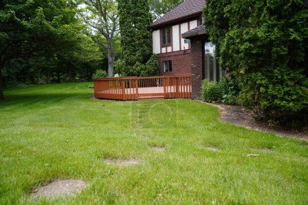 Photo for Fond du Lac, Wisconsin / USA - June 6th, 2019: Backyard of 1970s house out of Fond du Lac, Wisconsin - Royalty Free Image