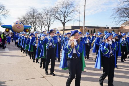 Photo for Green Bay, Wisconsin / USA - November 23rd, 2019: Notre Dame Academy musical marching band marched in 36th Annual Prevea Green Bay Holiday Parade hosted by Downtown Green Bay. - Royalty Free Image