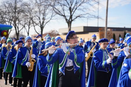 Photo for Green Bay, Wisconsin / USA - November 23rd, 2019: Notre Dame Academy musical marching band marched in 36th Annual Prevea Green Bay Holiday Parade hosted by Downtown Green Bay. - Royalty Free Image