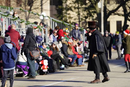 Photo for Green Bay, Wisconsin / USA - November 23rd, 2019: Members of the community sang Christmas songs at the beginning of 36th Annual Prevea Green Bay Holiday Christmas Parade hosted by Downtown Green Bay. - Royalty Free Image