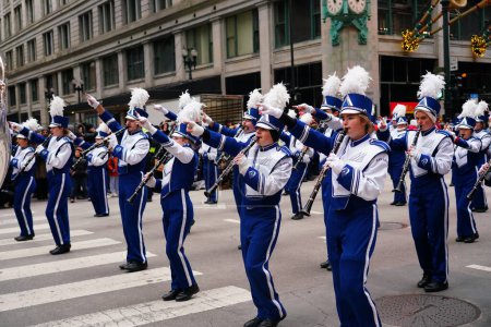 Photo for Chicago, Illinois / USA - November 28th 2019: Newport News, Virginia Christopher Newport University Marching Captains musical marching band marched in 2019 Uncle Dan's Chicago Thanksgiving Parade. - Royalty Free Image