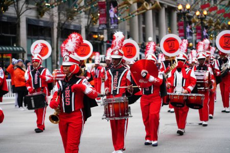 Photo for Chicago, Illinois / USA - November 28th 2019: Jonesboro, Georgia High School the Cardinals Musical Marching band marched in 2019 Uncle Dan's Chicago Thanksgiving Parade - Royalty Free Image
