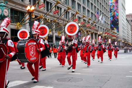 Photo for Chicago, Illinois / USA - November 28th 2019: Jonesboro, Georgia High School the Cardinals Musical Marching band marched in 2019 Uncle Dan's Chicago Thanksgiving Parade - Royalty Free Image