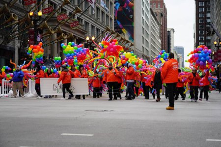 Photo for Chicago, Illinois / USA - November 28th 2019: Members of 2019 Uncle Dan's Chicago Thanksgiving Parade wore balloons and toy balloons and walked around in the Thanksgiving Parade. - Royalty Free Image