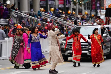 Photo for Chicago, Illinois / USA - November 28th 2019: Punjabi Culture Society participated and danced in the 2019 Uncle Dan's Chicago Thanksgiving Parade. - Royalty Free Image
