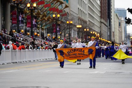 Photo for Chicago, Illinois / USA - November 28th 2019: St Francis Borgia Regional High School Knights Musical Marching band marched in 2019 Uncle Dan's Chicago Thanksgiving Parade. - Royalty Free Image