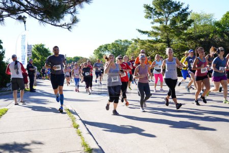 Photo for Fond du Lac, Wisconsin / USA - June 8th, 2020: Community members of fond du lac participate in walleye weekend running competition. - Royalty Free Image
