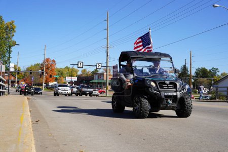 Photo for Mauston, Wisconsin / USA - October 10th, 2020: 45th president trump supporters in atvs and utvs traveled through mauston showing their support. - Royalty Free Image