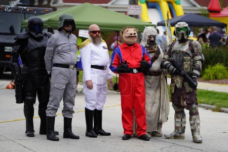 Photo for Manitowoc, Wisconsin / USA - September 7th, 2019: 501st Midwest Garrison Star Wars theme costume wearers attended the annual Sputnikfest bringing joy to many attendees and children at the event - Royalty Free Image