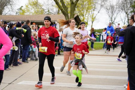 Photo for Fond du Lac, Wisconsin / USA - May 11th, 2019: Many community members came out for Girls on the Run to help support the local Women's Organization. - Royalty Free Image