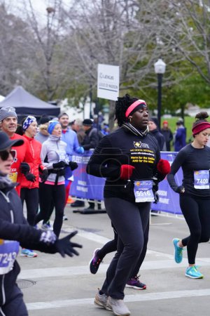 Photo for Madison, Wisconsin / USA - November 10th, 2019: Many runners and joggers throughout Wisconsin and the neighboring states came out to MADISON MARATHON PRESENTED BY SSM HEALTH. - Royalty Free Image