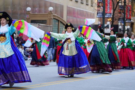 Photo for Chicago, Illinois USA - November 23rd, 2023: Chicago Korean dance company participate in 2023 Chicago Thanksgiving Parade. - Royalty Free Image
