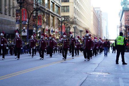 Photo for Chicago, Illinois / USA - November 28th 2019: Southland College Prep Charter High School Musical Marching band of Richton Park, Illinois marched in 2019 Uncle Dan's Chicago Thanksgiving Parade. - Royalty Free Image