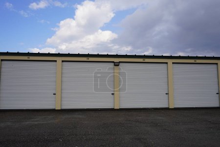 Photo for Green and Tan storage units holding the owner's property. - Royalty Free Image