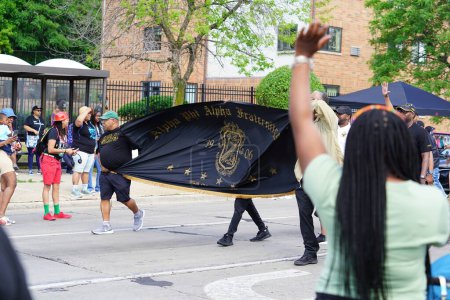 Photo for Milwaukee, Wisconsin USA - June 19th, 2021: Black African-American fraternities participated and walked in Juneteenth celebration parade. - Royalty Free Image
