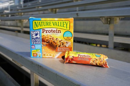 Photo for Beaver dam, Wisconsin / USA - June 27th, 2020: Box of 5 nature valley peanut butter dark chocolate 10 grams of protein 7.1 Oz chewy bars - Royalty Free Image