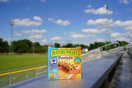 Photo for Beaver dam, Wisconsin / USA - June 27th, 2020: Box of 5 nature valley peanut butter dark chocolate 10 grams of protein 7.1 Oz chewy bars - Royalty Free Image