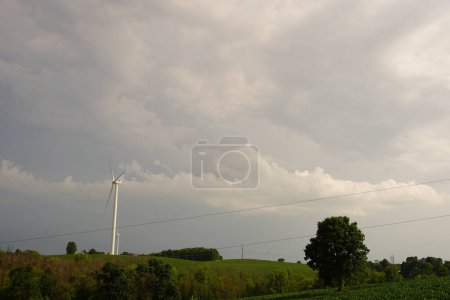 Photo for Thick thunder, lighting, and rain storm clouds traveling over fond du lac, wisconsin. - Royalty Free Image