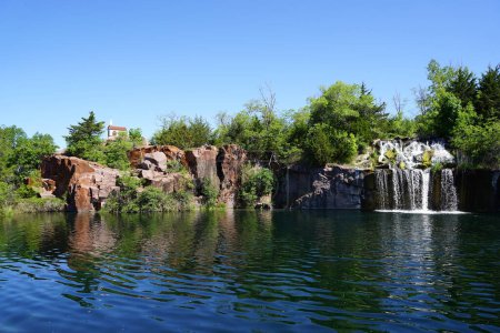 Rock formation, waterfalls, and pond at Daggett Memorial Park in Montello, Wisconsin