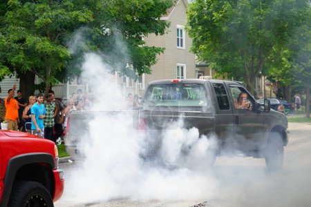 Photo for Fond du Lac, Wisconsin / USA - July 18th, 2020: Members of fond du lac did burnouts in the trucks in the streets. - Royalty Free Image