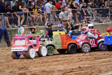 Photo for Pickett, Wisconsin / USA - September 18th, 2020: Power wheels with kids driven in hollywood motorsports entertainment annual paws for the cause demolition derb - Royalty Free Image