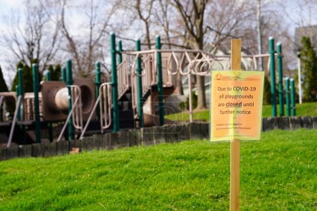 Photo for Fond du Lac, Wisconsin / USA - April 3rd, 2020: Many playgrounds and parks are restricted due to the covid-19 coronavirus pandemic spreading throughout the United States of America. - Royalty Free Image
