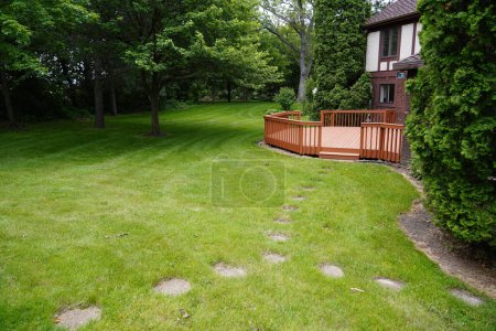 Photo for Fond du Lac, Wisconsin / USA - June 6th, 2019: Backyard of 1970s house out of Fond du Lac, Wisconsin - Royalty Free Image
