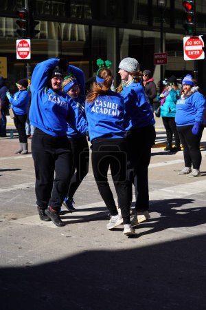 Photo for Milwaukee, Wisconsin USA - March 12th, 2022: Cashel Academy Irish dancers danced in St. Patrick's day parade. - Royalty Free Image