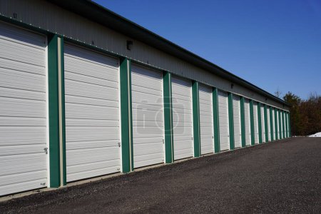 Photo for Green and Tan storage units holding the owner's property. - Royalty Free Image
