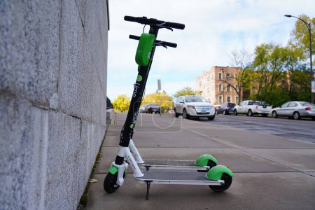 Photo for St. Paul, Minnesota / USA - October 19th, 2019: Lime Electric Scooters are being used all around St. Paul, Minnesota to give people much enjoyment in their travels. - Royalty Free Image