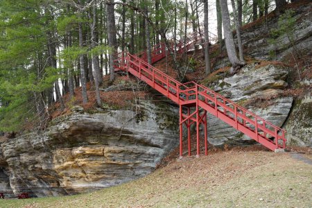 Photo for A path of Red stairs lead up a rocky hillside at Rockbridge, Wisconsin - Royalty Free Image