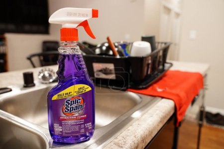 Photo for Fond du Lac, Wisconsin USA - April 6th, 2024: A purple spray bottle of Lavender S and Span COVID killing antibacterial cleaner sits on the kitchen counter. - Royalty Free Image