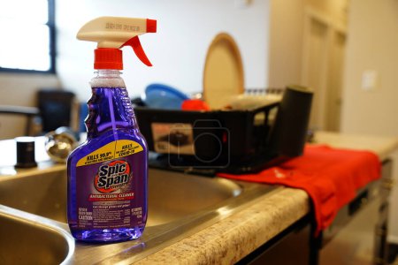 Photo for Fond du Lac, Wisconsin USA - April 6th, 2024: A purple spray bottle of Lavender S and Span COVID killing antibacterial cleaner sits on the kitchen counter. - Royalty Free Image