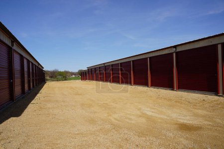 Photo for Red storage unit buildings holding owners property. - Royalty Free Image