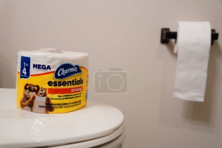 Photo for Fond du Lac, Wisconsin USA - April 21st, 2024: Single roll of Charmin Essentials strong Mega toilet paper roll. - Royalty Free Image