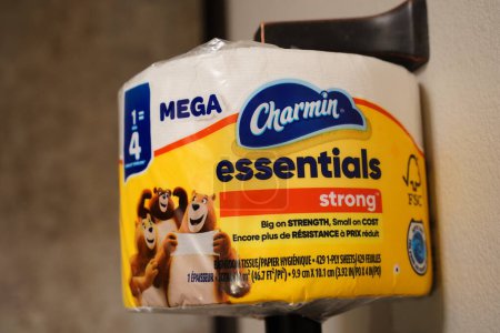 Photo for Fond du Lac, Wisconsin USA - April 21st, 2024: Single roll of Charmin Essentials strong Mega toilet paper roll. - Royalty Free Image