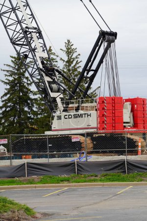 Photo for Ripon, Wisconsin USA - May 12th, 2024: Link-Belt 298 Series 2 construction crane used by C.D. Smith construction at a construction site. - Royalty Free Image
