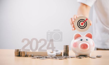 Target Goal challenge concept. Start calendar 2024 plan. Man with piggy bank for seo marketing action strategy, Resolution, Goal, Plan, Money Saving, Retirement fund, Pension, Investment Financia
