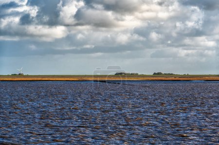 Photo for Hightide in the Wadden sea, The Netherlands - Royalty Free Image