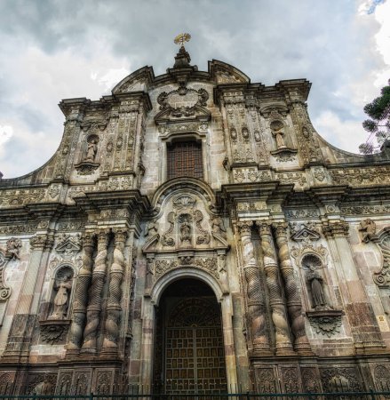 Photo for The facade of the Church of the Society of Jesus (La Iglesia de la Compania de Jesus) in the city of Quito, in Ecuador, South America - Royalty Free Image